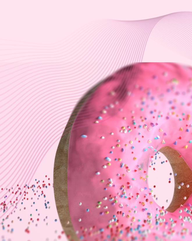 A lovely looking pink sprinkled donut.