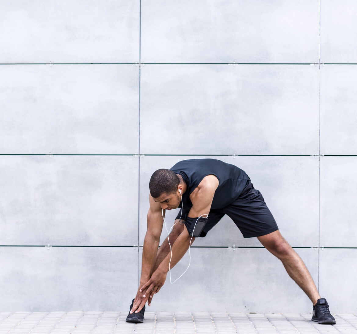 A young man getting ready to work out.